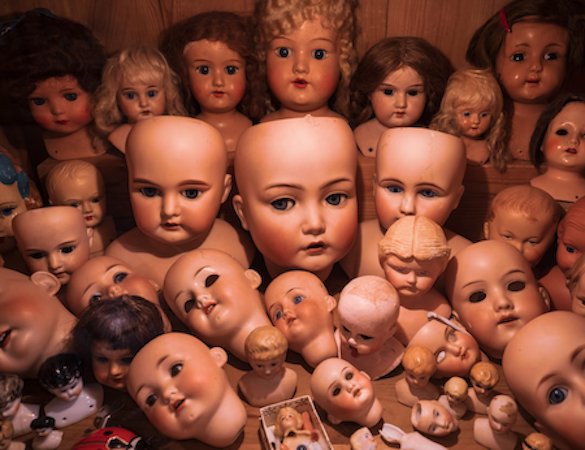 A bunch of creepy doll heads that Ms Bennett hates